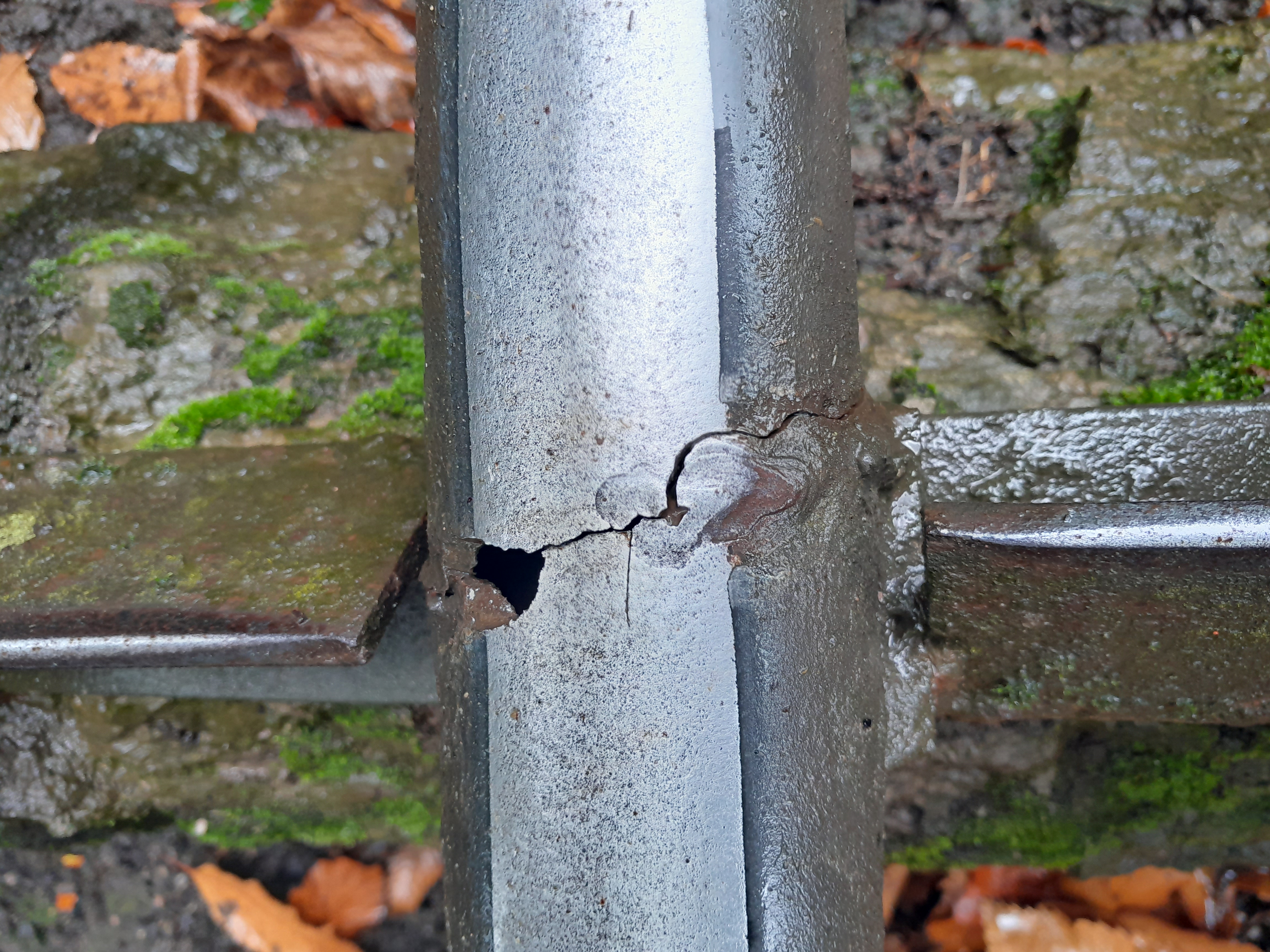 Cracked cattle grid defect close-up
